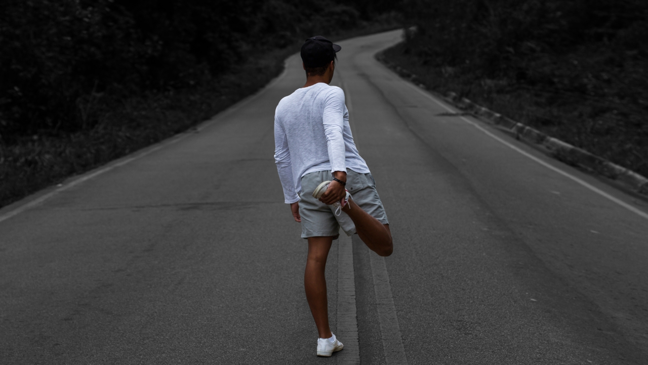 Man performing static stretches